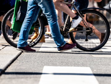 Image shows people crossing a crosswalk