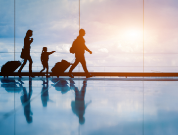 Image shows people at an airport
