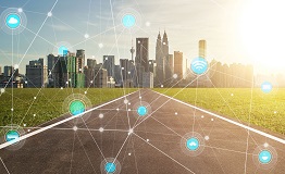 Image depicting a wired and connected city landscape.