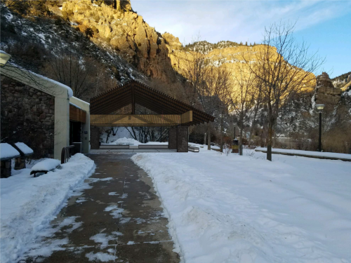 A shelter for visitors, next to the restroom facility.