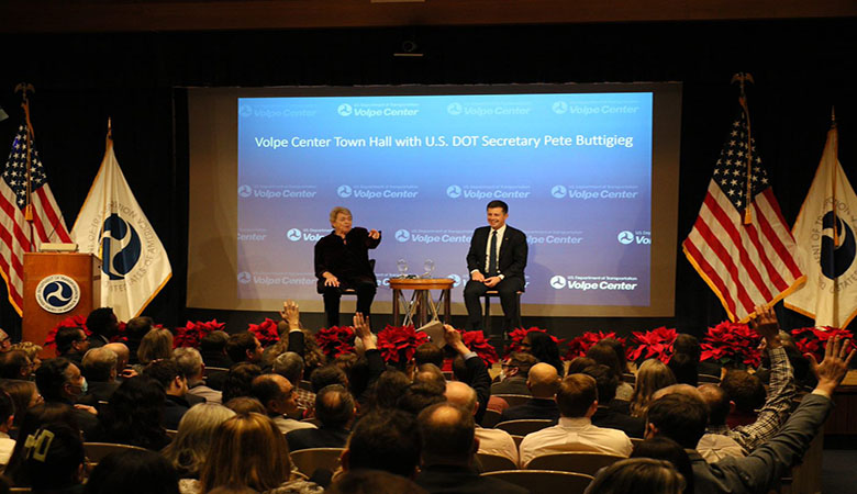 U.S. Secretary of Transportation Pete Buttigieg and U.S. DOT Volpe Center Director Anne Aylward engaged in an interactive Town Hall during the Secretary’s visit to the U.S. DOT Volpe Center on December 14, 2022. (U.S. DOT Volpe Center image)
