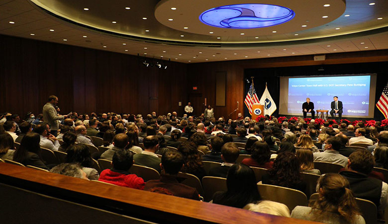 U.S. Secretary of Transportation Pete Buttigieg takes questions from staff during his visit to the U.S. DOT Volpe Center on December 14, 2022. (U.S. DOT Volpe Center image)
