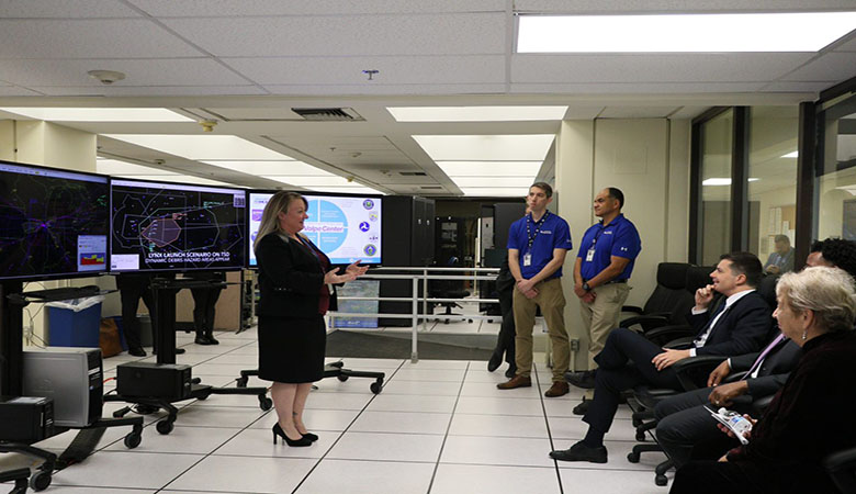 U.S. Secretary of Transportation Pete Buttigieg engaged with U.S. DOT Volpe Center staff on work underway on Advanced Air Mobility during his visit to the U.S. DOT Volpe Center on December 14, 2022. (U.S. DOT Volpe Center image)