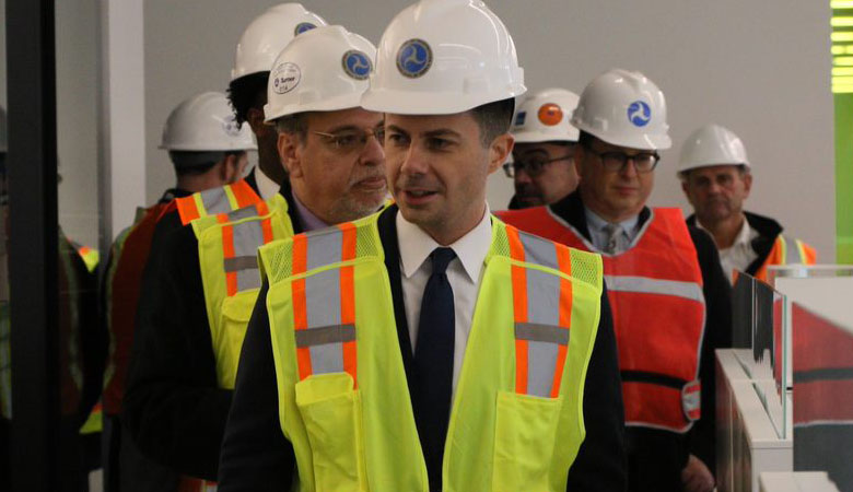 U.S. Secretary of Transportation Pete Buttigieg tours the new U.S. DOT Volpe Center facility on December 14, 2022. (U.S. DOT Volpe Center image)