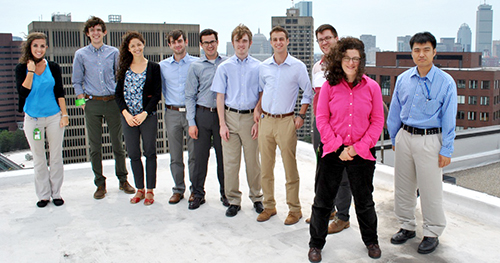 Interns from Volpe's Pathways Programs pose on the roof.