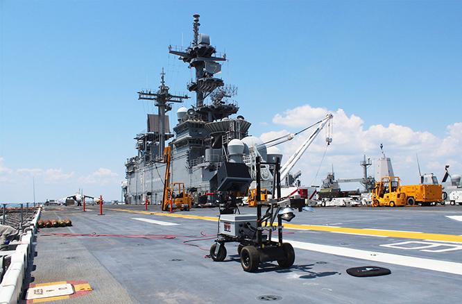ThermalStare’s Infrared Coating Inspection System (IR-CIS) inspects the flight deck of an amphibious assault ship to detect defects that may result in damaging conditions for aircraft. (Photo: Fuchs Consulting, Inc.) ThermalStare’s Infrared Coating Inspection System (IR-CIS)