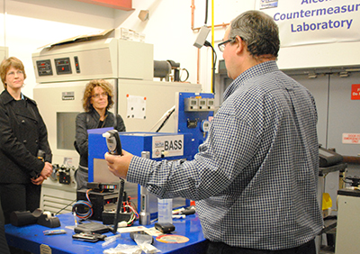 Volpe staff demonstrate equipment in the alcohol countermeasures laboratory.