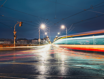 Image shows train at night