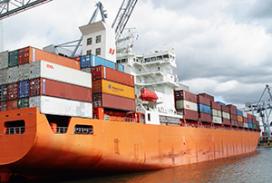 A container ship at docked at sea.