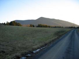 Road and grasslands with mountains in the background at the Cedar Creek and Belle Grove National Historic Park
