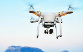 A drone flying near an island.