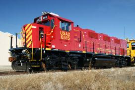 USAX 6515: a three-engine 2,100-horsepower GenSet Road-switcher U.S. Army locomotive, shown here on a track at Fort Bragg, North Carolina.