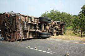 An average accident involving a truck leads to 3.2 tons of C02 emissions due to detours and delays, with nearly 11 tons of CO2 emitted for an accident on an urban expressway. (The final miracle/123RF Stock Photo) Large truck overturned on a highway