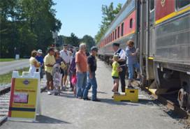 Passengers boarding a train at the Canal Visitor Center.