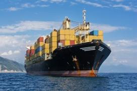 Large container ship sailing out on open water