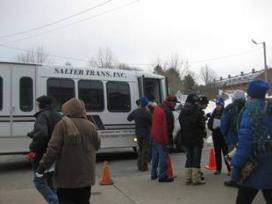 Parker River National Wildlife Refuge visitors in front of a bus