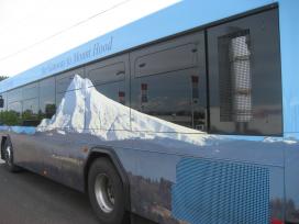 A bus depicting a mountain on its side at Mt. Hood National Forest. 